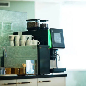 Magna tal-kafè u Espresso awtomatika kummerċjali - Barista u Espresso